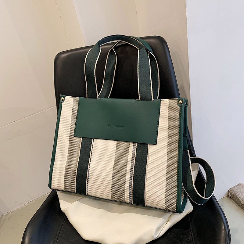 Bolso de mano transfronterizo japonés y coreano para mujer 2023 nueva moda bolso de color de contraste a rayas bolsa de mensajero de hombro de gran capacidad