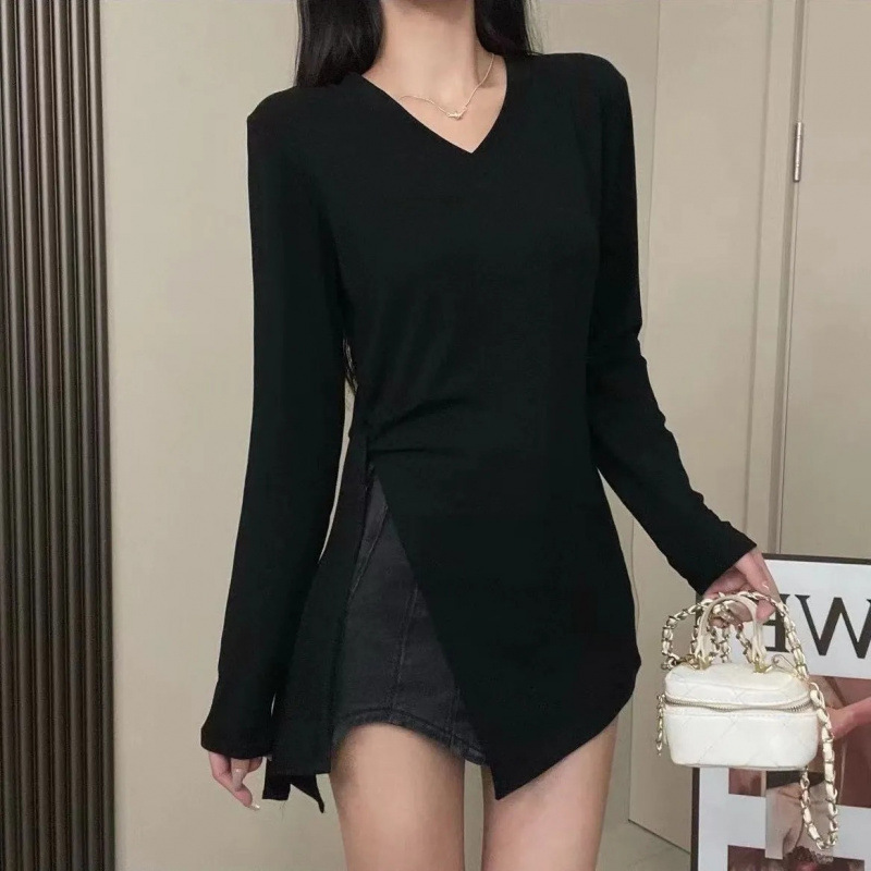 大きいサイズの婦人服は不規則に黒いvネックの長袖のtシャツを開けます。|undefined