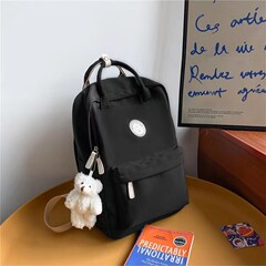 日本インスバックパック韓国版中学生スクールバッグレディーストレンディな大容量ソリッドカラーナイロン高価値バックパック