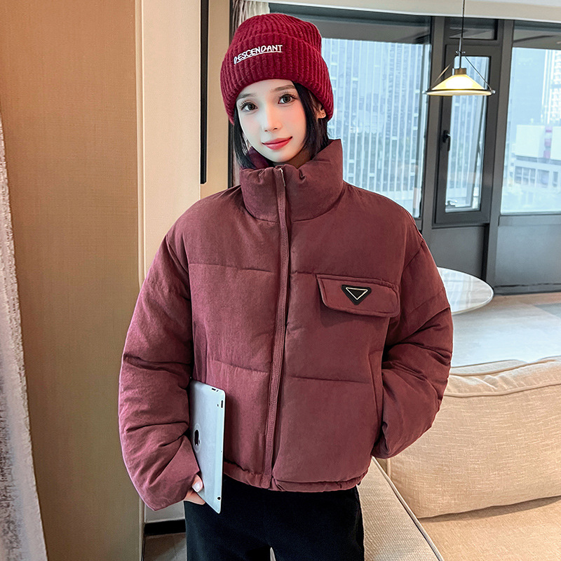 Invierno de 2025 nuevo temperamento de moda femenina simple y grueso hombre pequeño abrigo de algodón de plumón corto
