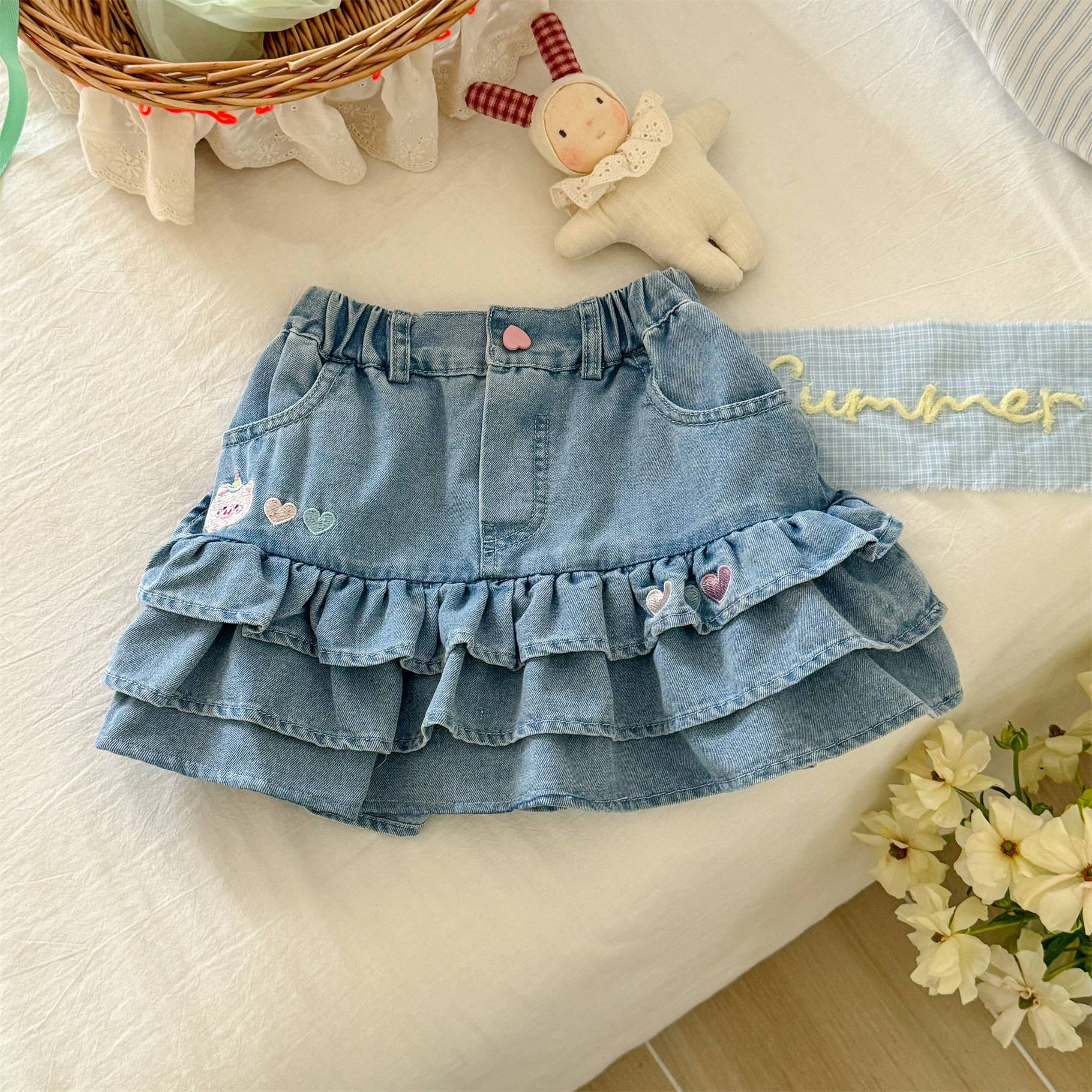 Falda de mezclilla de siete niñas de limón salado, estilo fino de verano de cinco puntos, nuevo estilo, bebé, ropa exterior, falda caliente para niños