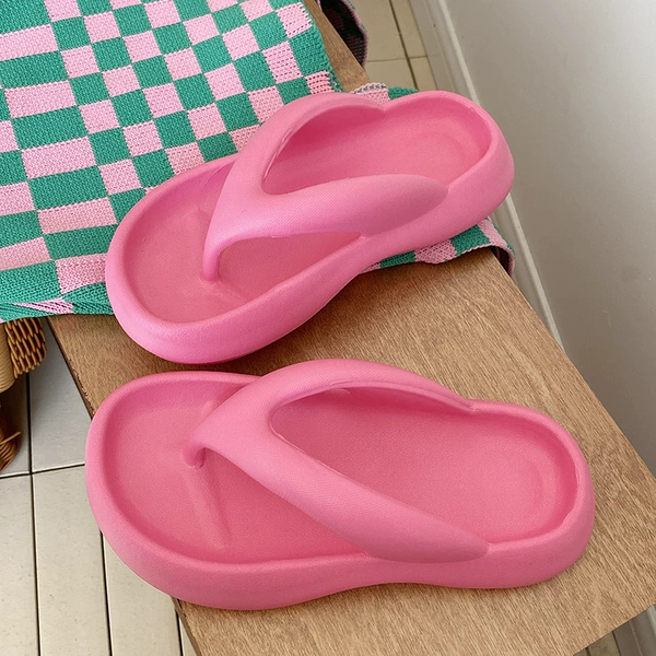Red flip flops platform