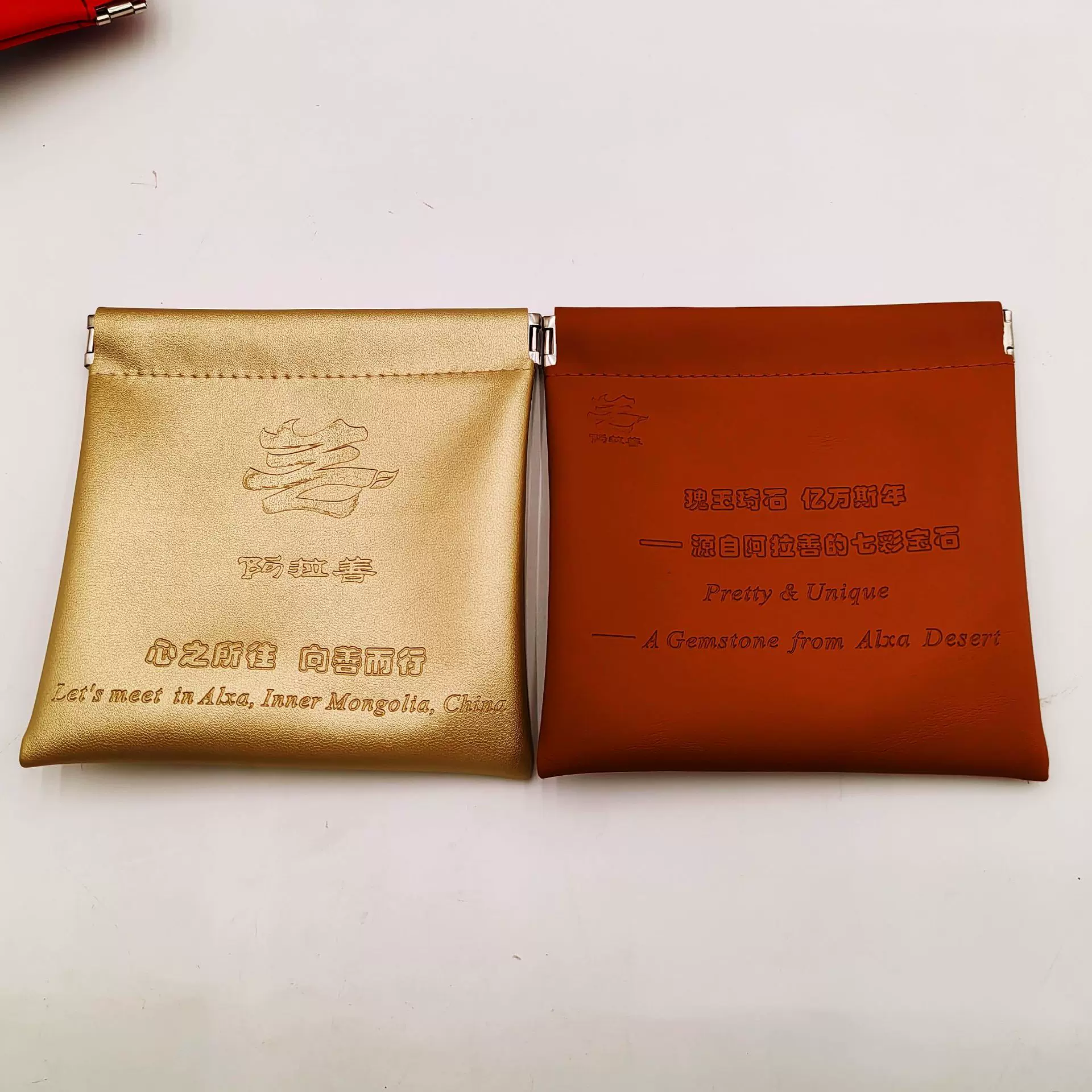 定制便携式收纳包自动闭合化妆袋子pu皮质防水简约弹片收纳化妆包