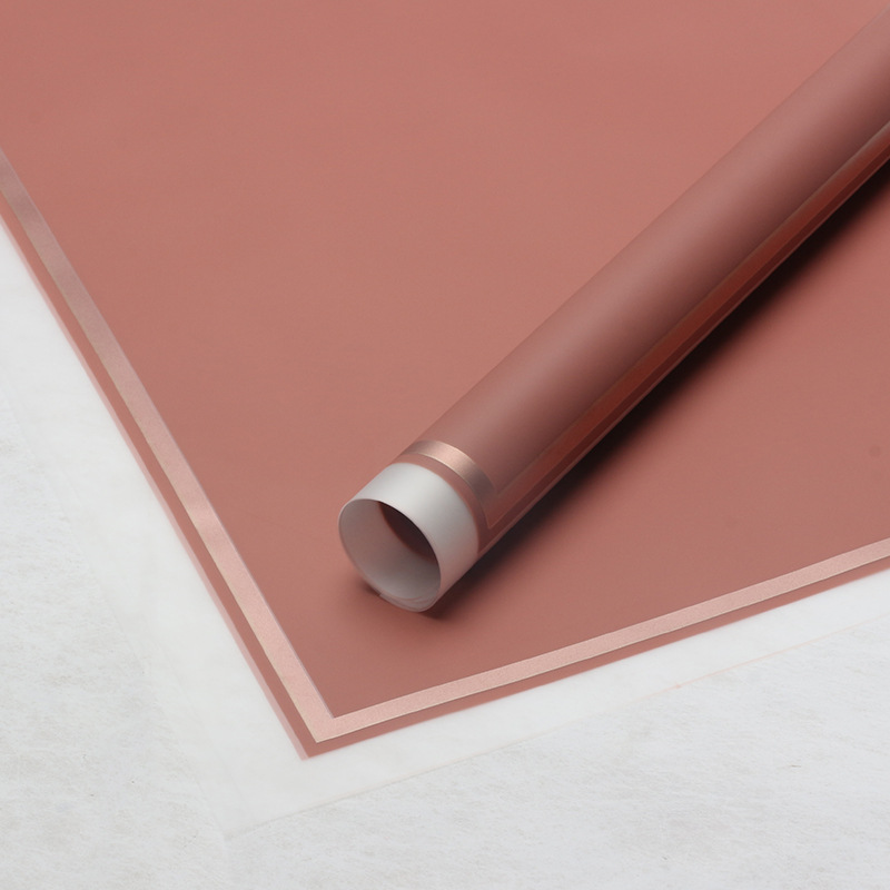 Huaxi transfronterizo Han Bundle de papel volador de película de gel de envoltura de flores impermeable florista suministros de flores papel de envoltura de ramo