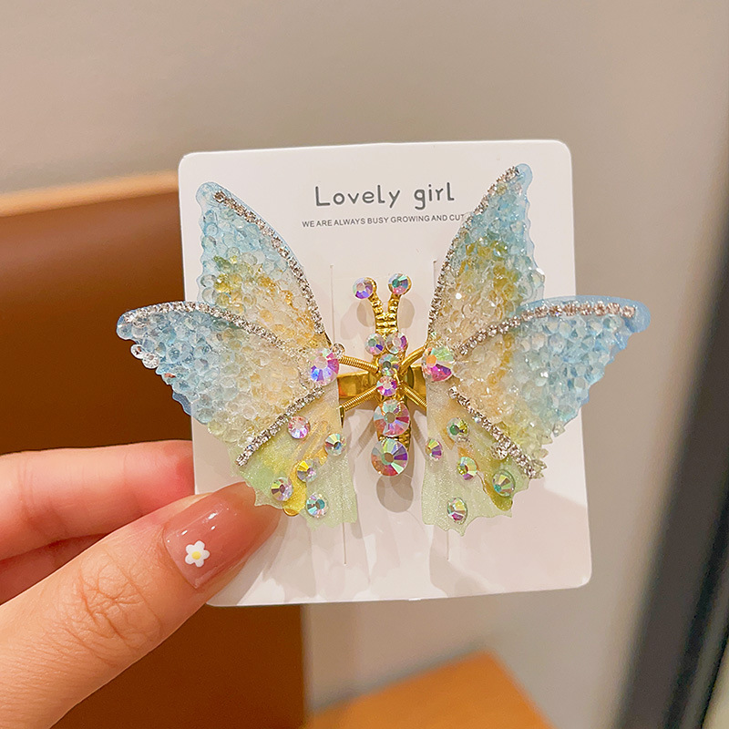 Horquilla de mariposa en movimiento horquilla de diamantes de imitación súper inmortal para niños 2025 nuevo clip de cabello roto lateral de niña accesorios para el cabello