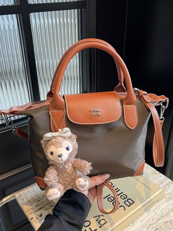 Nylon color contrastante empalme bolso de bolsillo portátil mujer 2024 nuevo estilo transfronterizo de alta calidad exquisita mochila de hombro