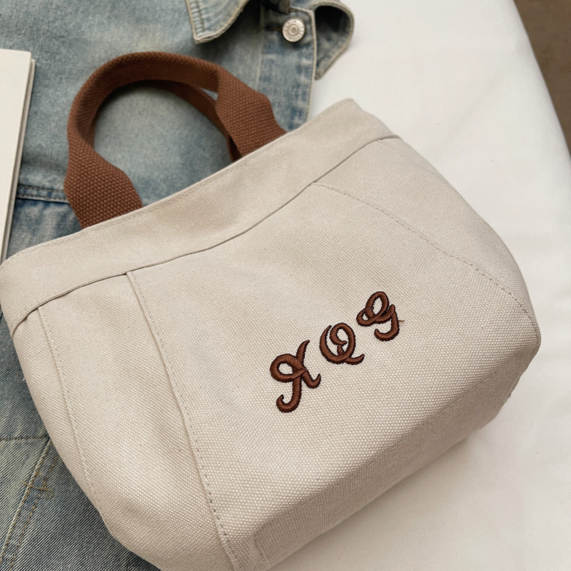 Vintage canvas schoudertas met geborduurde letter voor dames_voghion.com