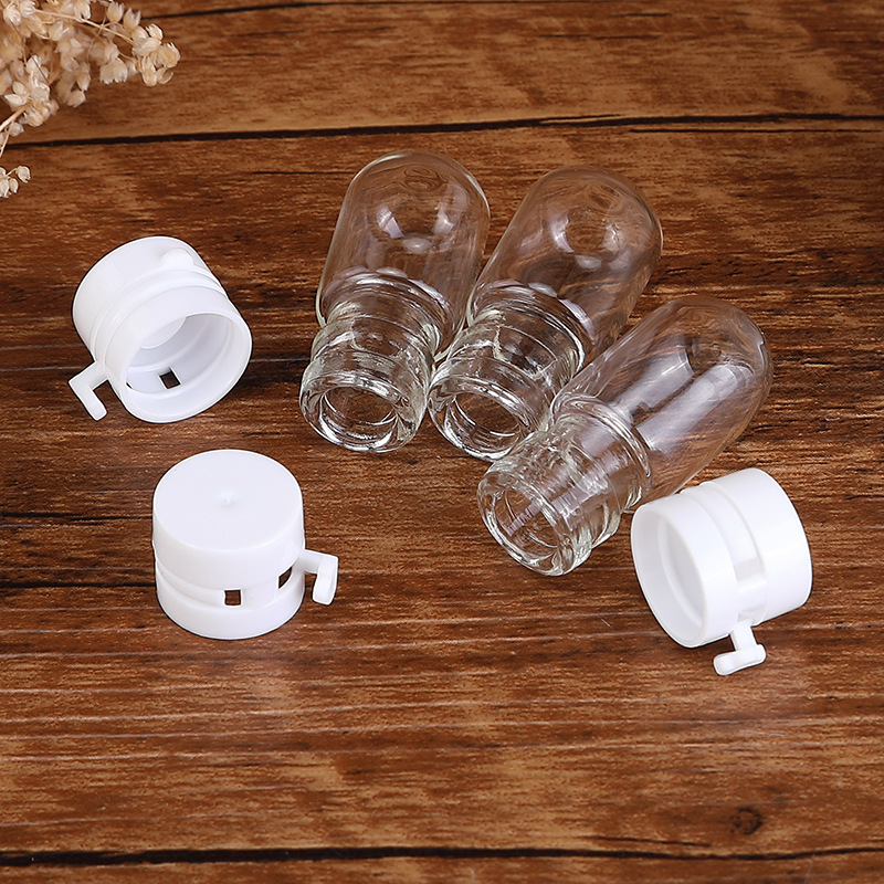 Fabricante en stock suministro 1,5 ml bombilla pequeña botella de belleza médica 3ml bayoneta líquida botella pequeña botella de esencia de vidrio de fondo redondo