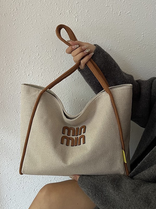 Bolsa de lona de hombro simple de gran capacidad de otoño y invierno nueva moda de moda de color de contraste de trabajo ocio bolsa de viaje