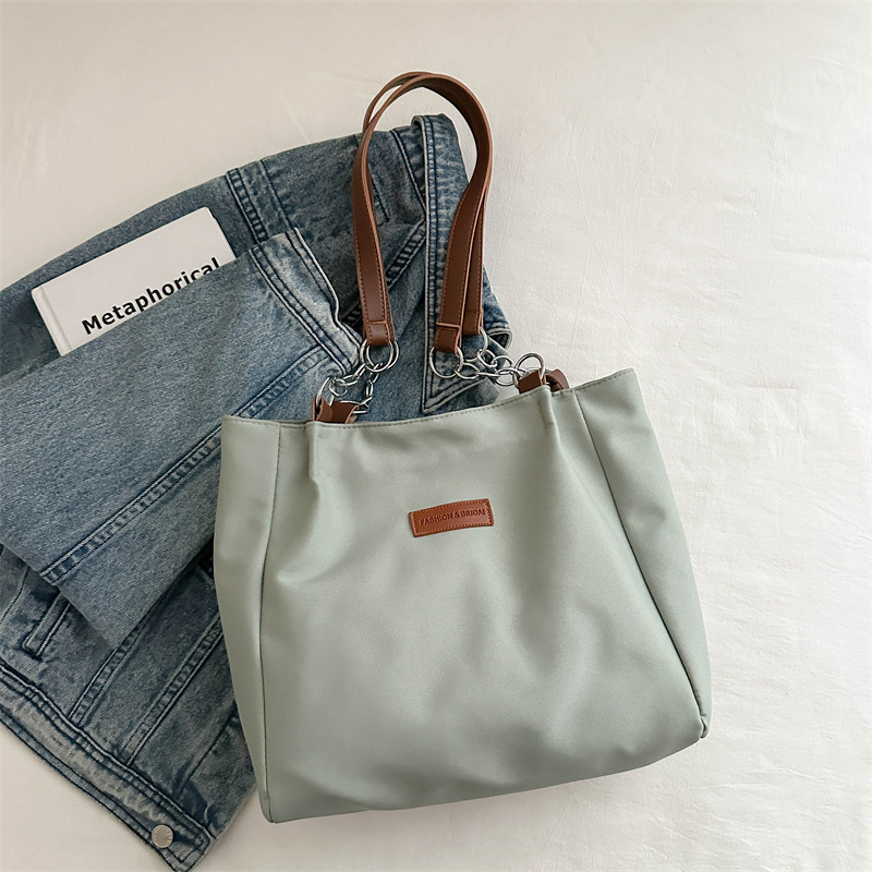 Casual bolsa de viaje de gran capacidad para mujeres 2024 nueva moda bolsa de lona universal bolso de hombro universal bolso simple
