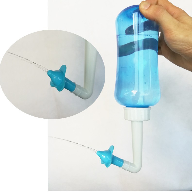 Nasal aspirator for nasal washing