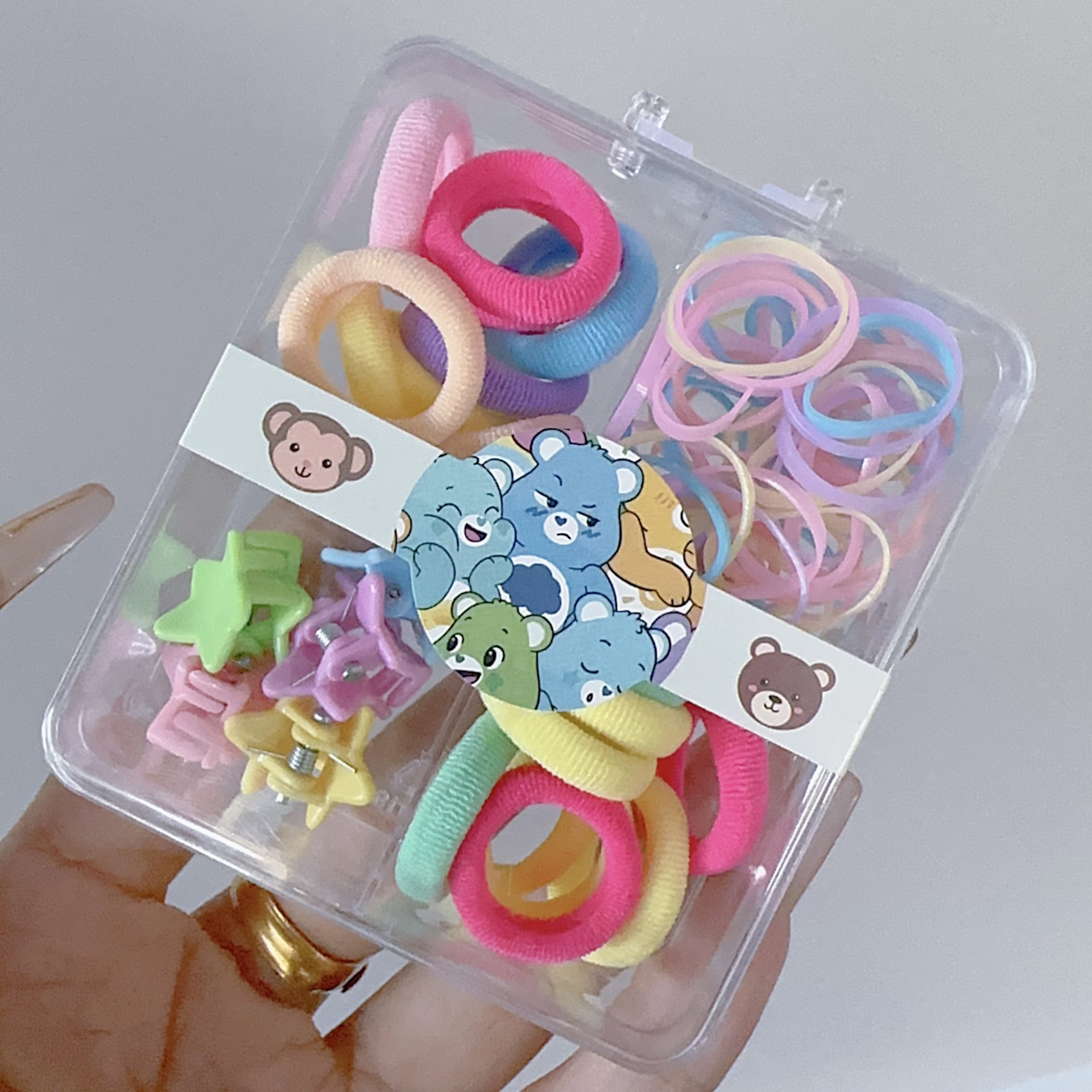 Al por mayor 2.5 pulgadas pulgar pequeño anillo de cabello nuevo niño no lesiones de cabello correa de color caja de chaqueta de cabello pequeña personalidad encantadora