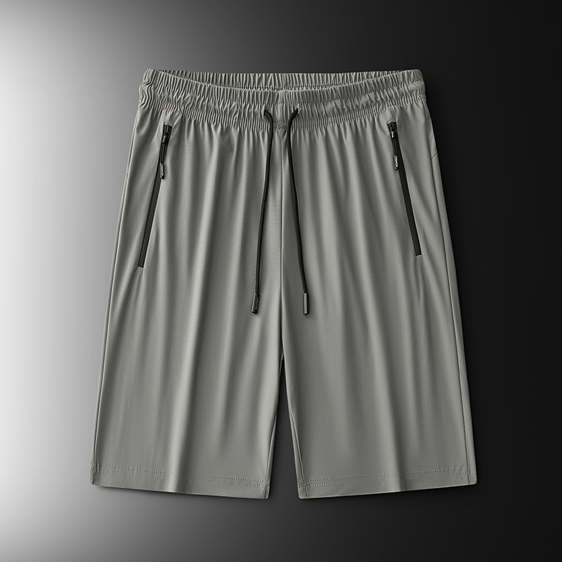 2025 nuevo verano más el tamaño de los pantalones deportivos de nailon pantalones de cinco puntos para hombres pantalones cortos de seda de hielo de color sólido de secado rápido fábrica al por mayor