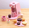 Pink strawberry coffee maker