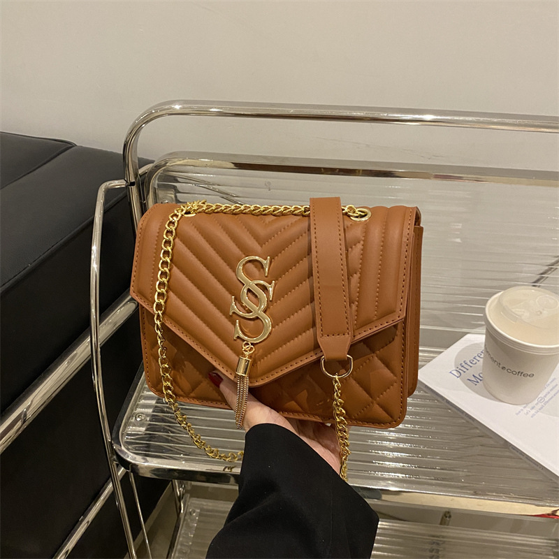 Cadena de hendidura de diamante bolso de hombro para mujeres 2025 primavera y verano nueva moda simple tendencia brazo bolso