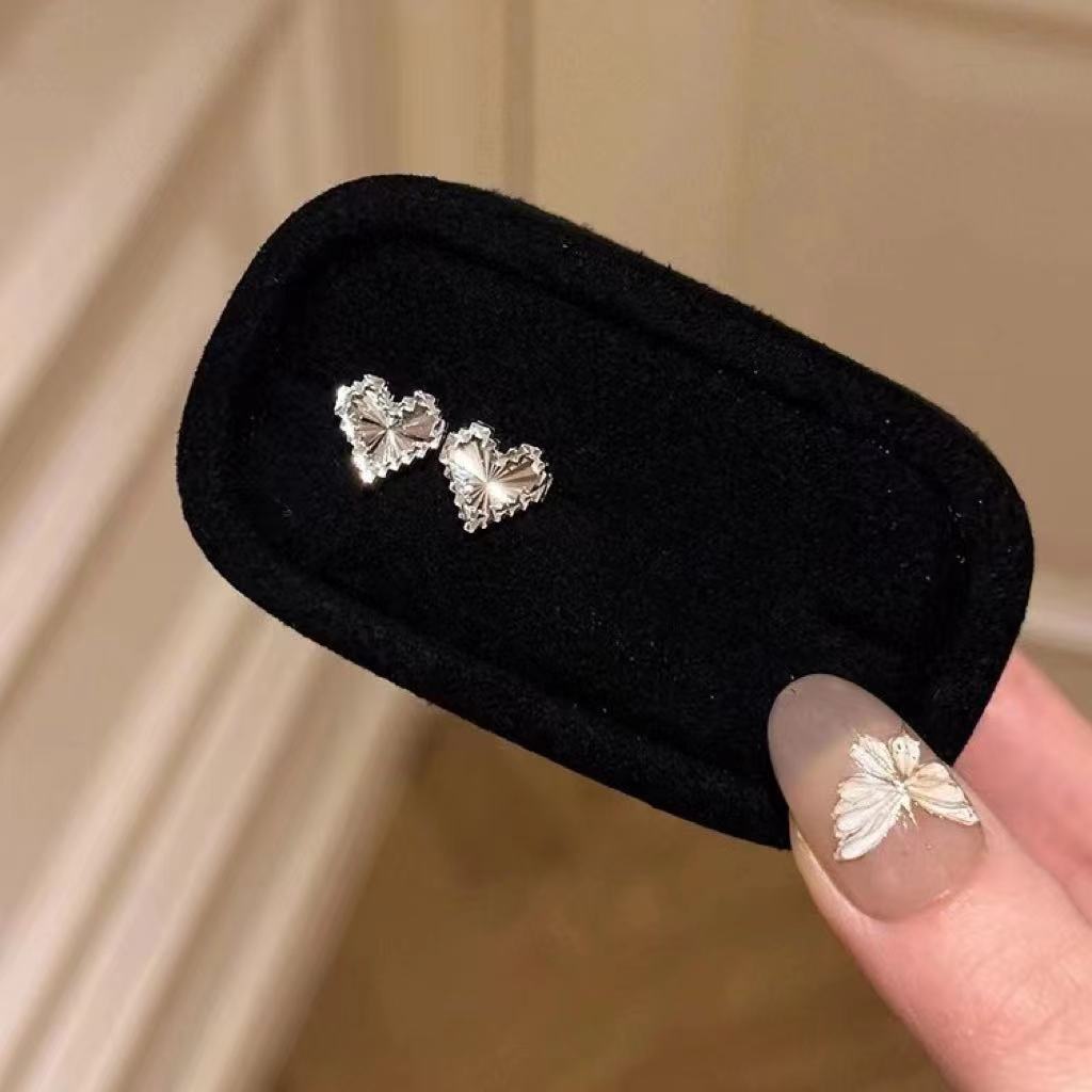 フランス式の清冷感の銀色の金属のイヤリングの真珠のドリルのフリンジデザイン感の耳飾りのファッションの高い顔の値の女性の耳飾り