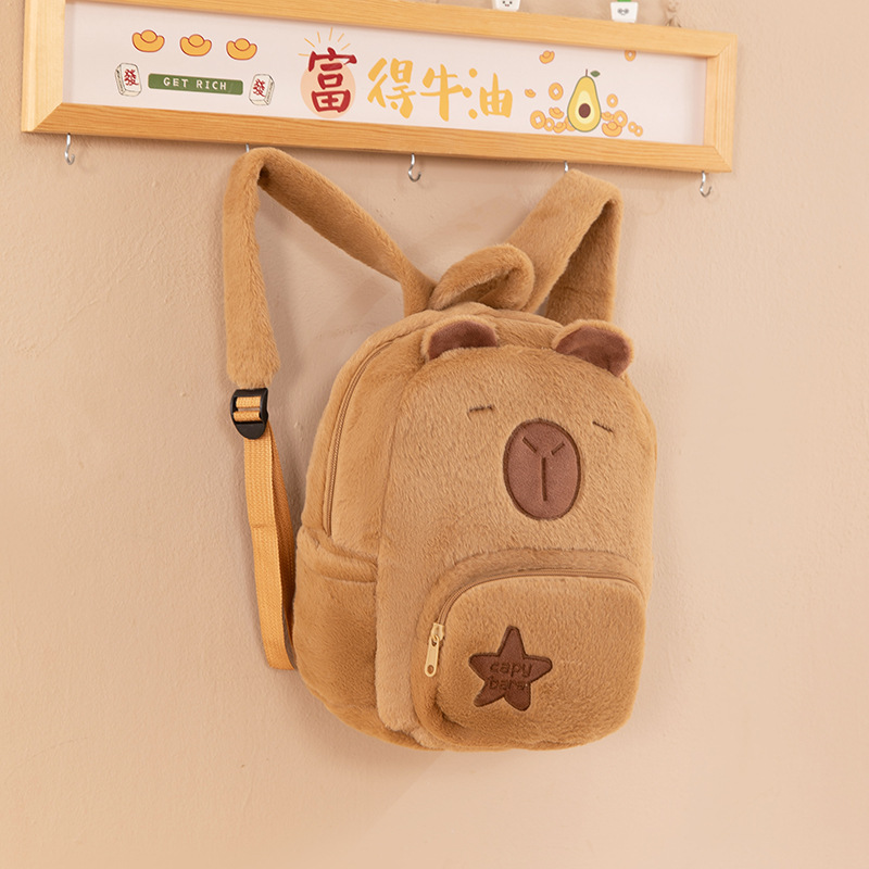 2025 nueva mochila de carpincho de felpa Kapibala linda mochila escolar salvaje bolso de piel de todo fósforo mochila pequeña de dibujos animados para mujer