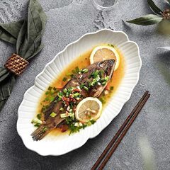 陶磁器の純白の魚の皿の高級感の家庭用蒸し魚の皿の焼き魚の大きいサイズの魚の皿の新型の料理の皿の楕円形の皿