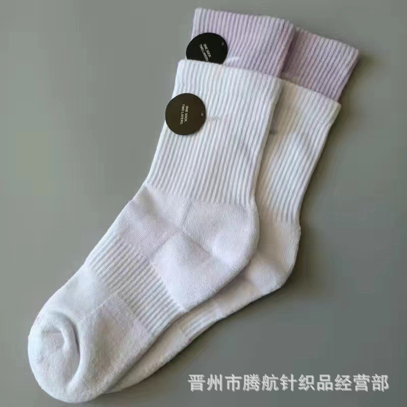 蘇万ナイキの靴下のカラーの二重は男女の中で長い筒のタオルの底のスポーツの靴下をつなぎ合わせてバスケットボールの靴下を走ります。