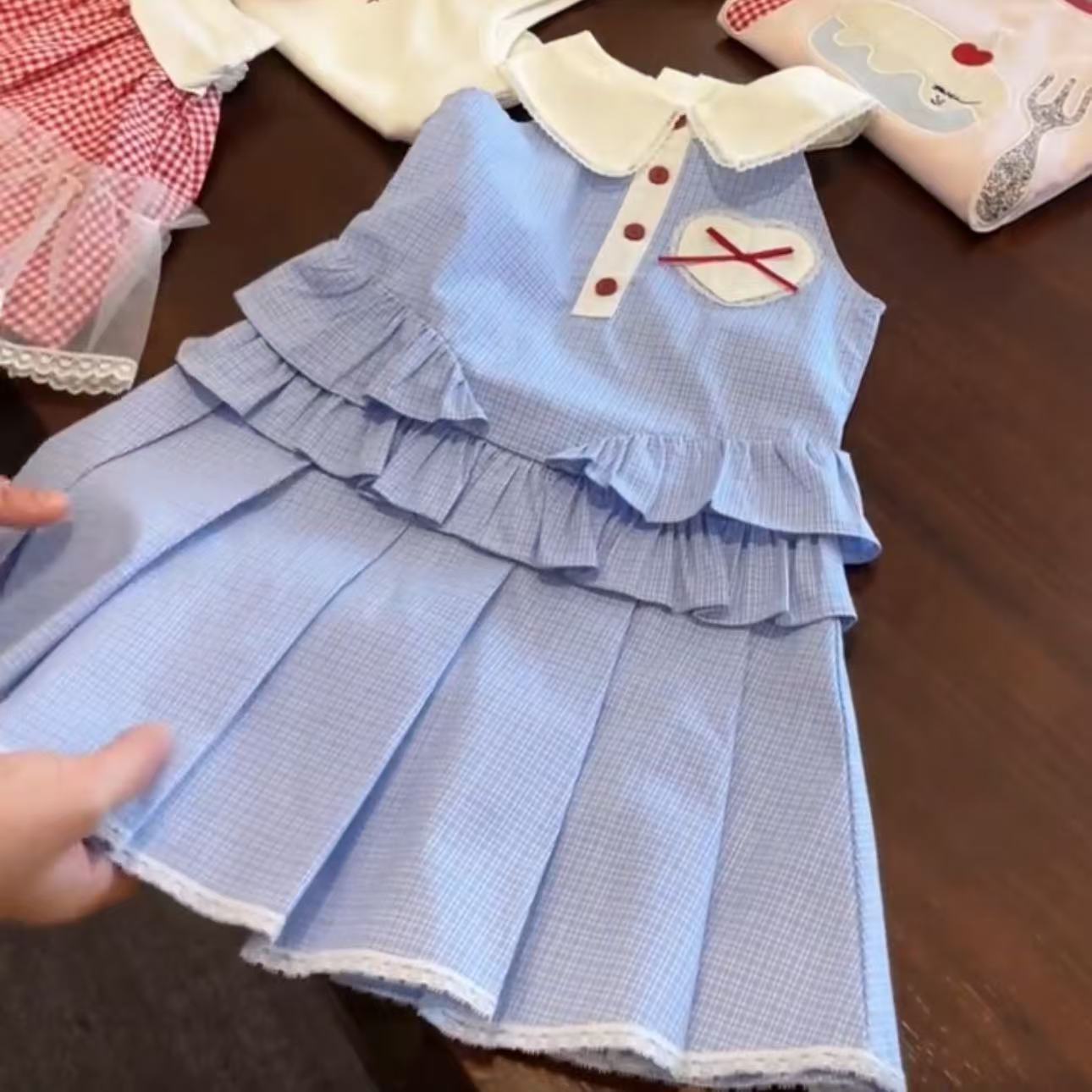 Qian Qi ropa infantil vestidos de niñas lindos verano 25 nuevos dulces bebés chalecos a cuadros azul claro
