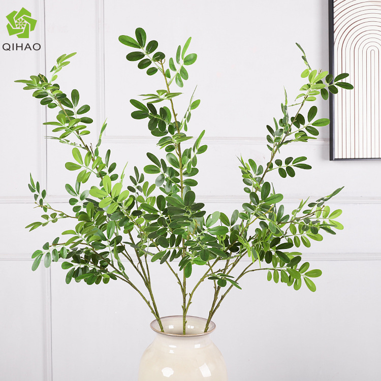 Simulated locust tree leaves, fake green plants, indoor flower arrangements, ornaments, home decoration, wedding props, fake locust tree leaves