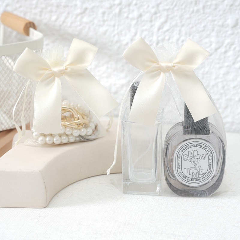 Bolso de gasa con lazo dorado transfronterizo, bolsa de dulces de boda, bolsa de regalo para fiesta, bolsa de embalaje de regalo, bolsillo con cordón