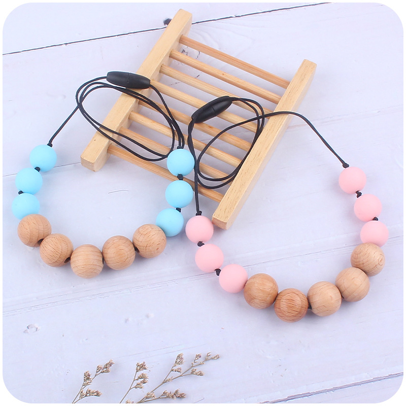 Nuevo bebé suministros silicona molar teether collar bebé teether palo masticable colgante collar