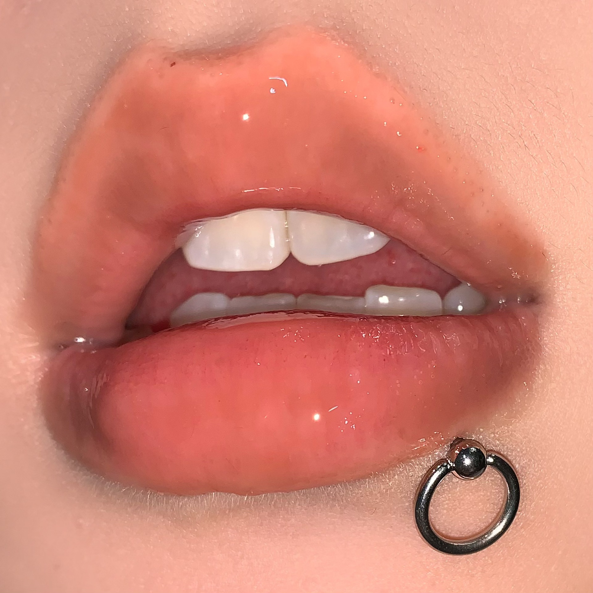 Silver pointed spike labret stud material detail