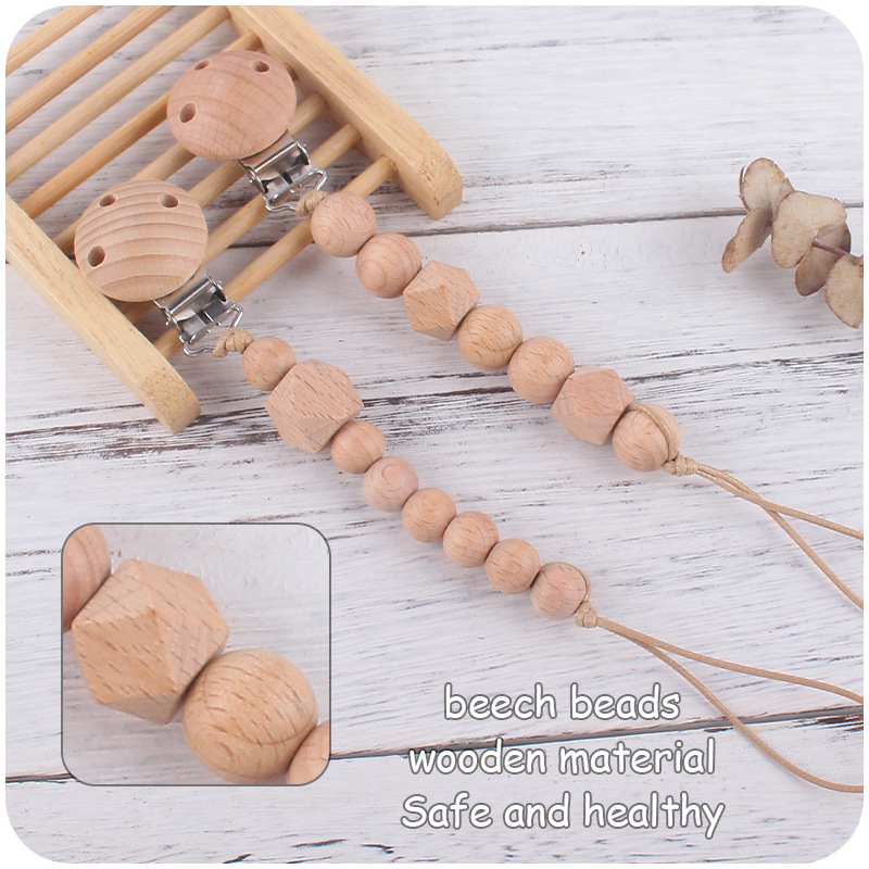 Nuevos suministros para bebés clip de chupete de haya calmante bebé Beech beads mordida mordedura chupete cadena anti-gota cadena