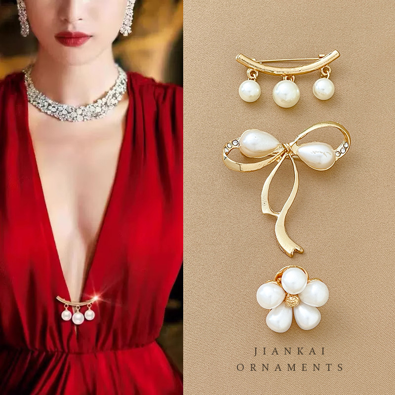 Arco de mariposa artefacto de alta gama sin costura broche pequeño temperamento femenino universal pin de ropa fija de traje collar