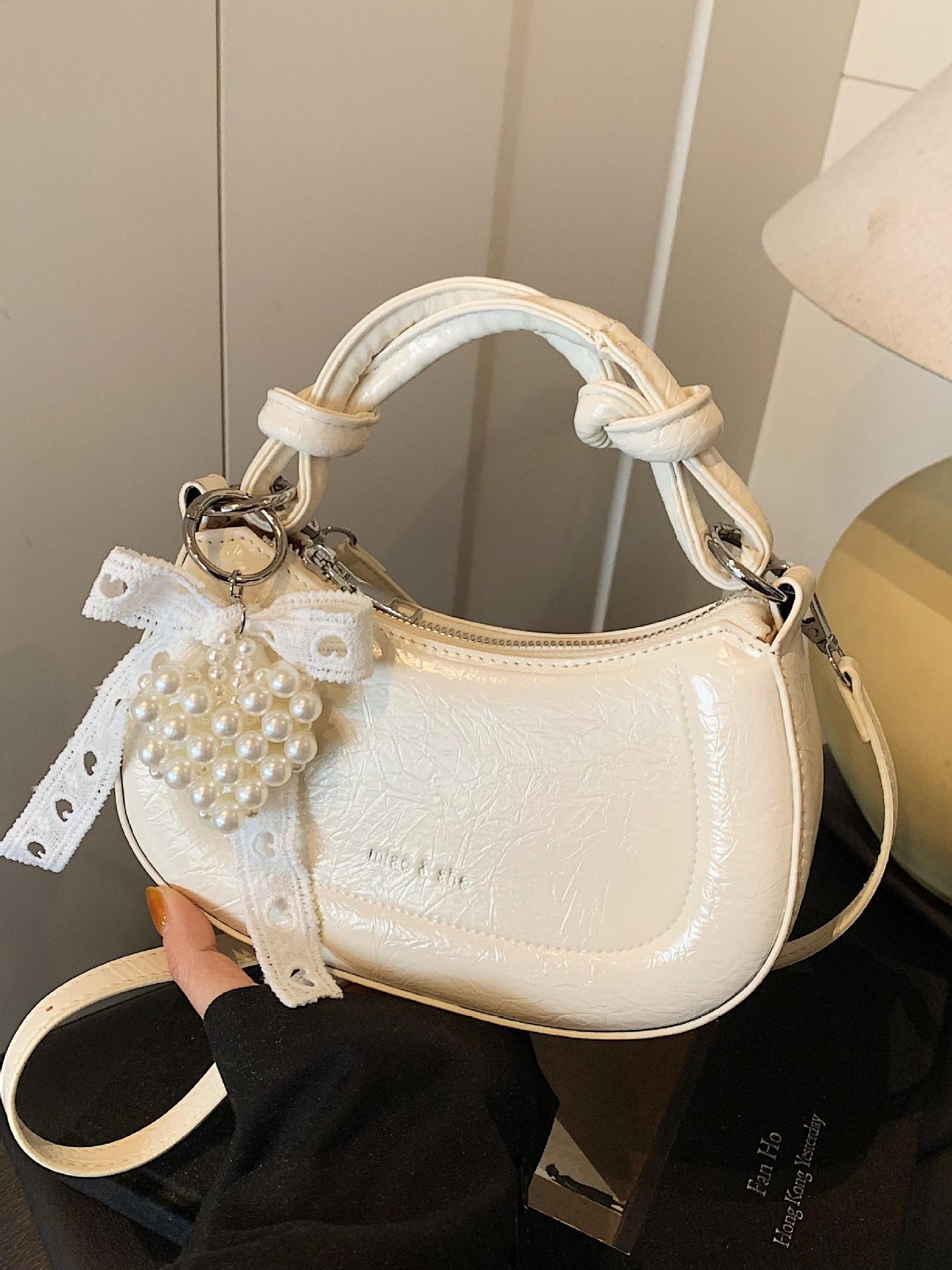 Bolso de nicho francés para mujer 2025 nuevo bolso de hombro casual de todo fósforo de moda bolso de silla de mensajero de estilo occidental