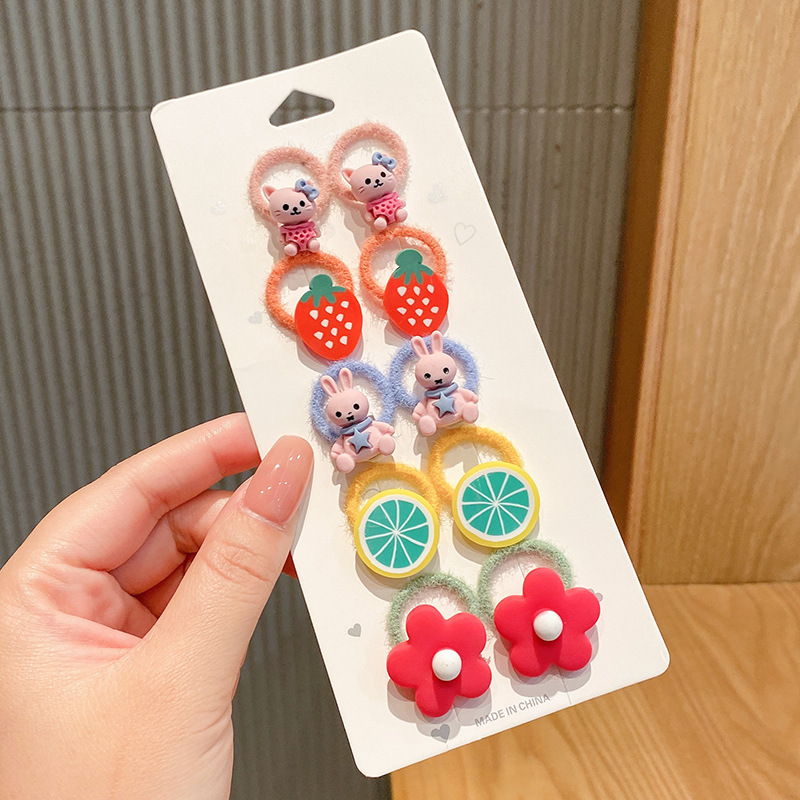 Los niños de la banda del pelo del bebé de la historieta no lastiman la banda de goma del pelo de la niña volumen del pelo menos cuerda del pelo del bebé