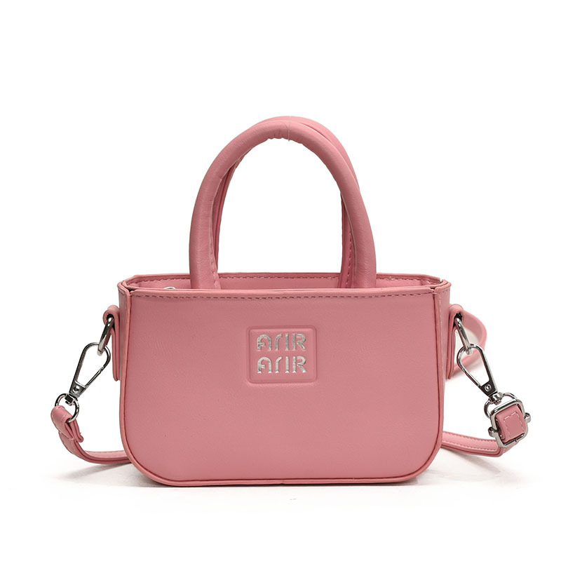 Coreana para niños y niñas bolsos pequeños, mini lindos bolsos de bebé de color sólido de moda 2025 nuevos niños bolsos de hombro
