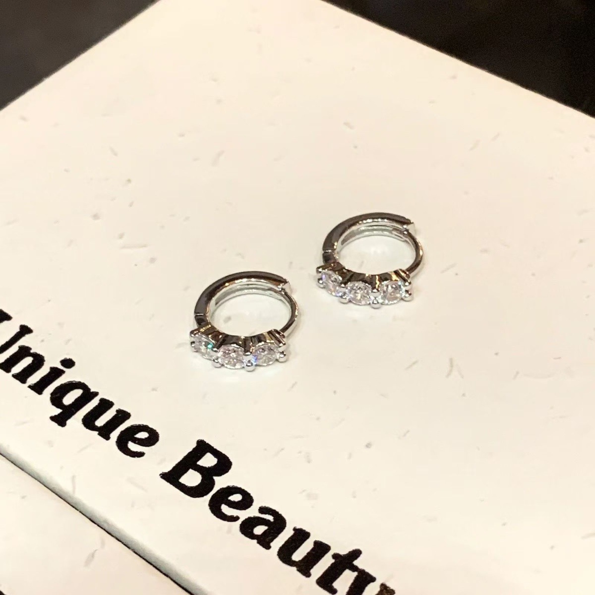 Sophisticated hoop earrings with zircon