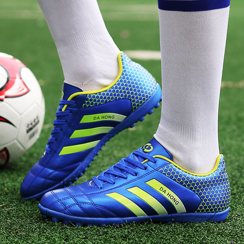 En stock zapatos de fútbol uñas largas para hombres y mujeres de bajo-top antideslizante más tamaño zapatillas deportivas transpirables zapatos de entrenamiento para adultos de moda que absorben los golpes