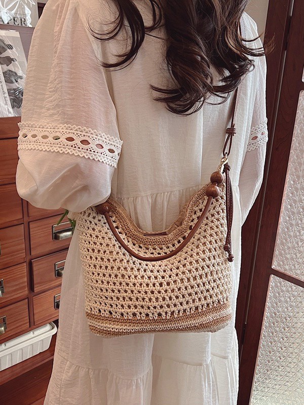 Vacaciones en la playa nuevas bolsas de mujer 2026 moda hueco trenzado bolsa de playa de viaje simple bolsa tote mochila image 5