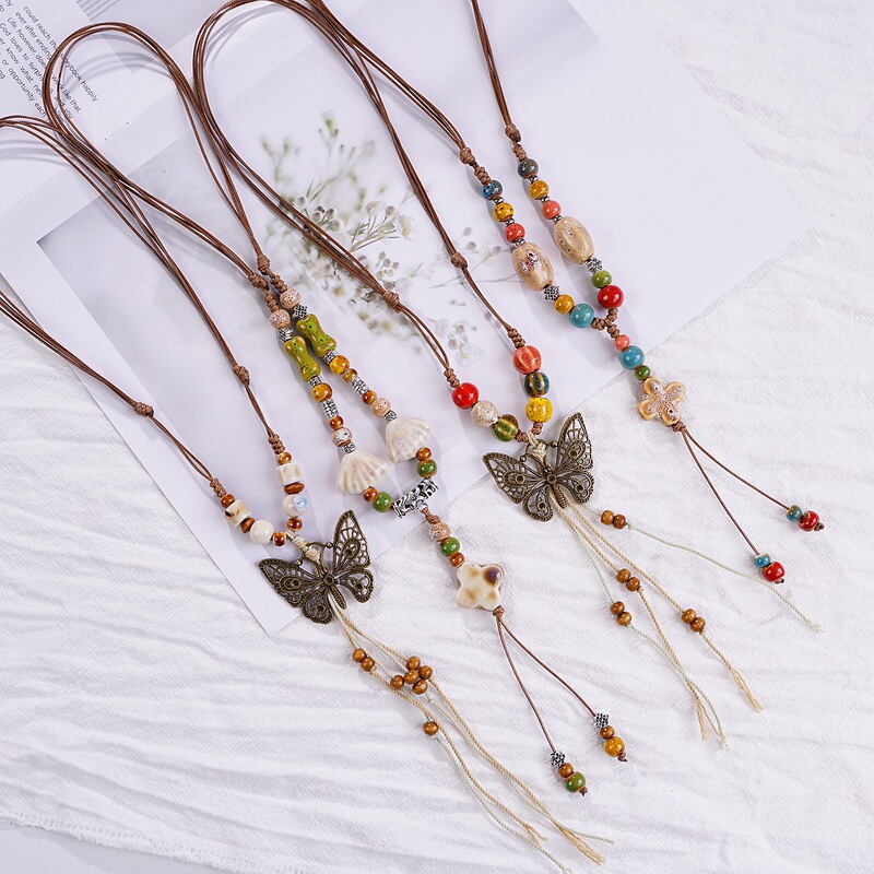 Jingdezhen ceramic necklace female light luxury niche autumn and winter butterfly sweater necklace female cross-border jewelry a generation of women