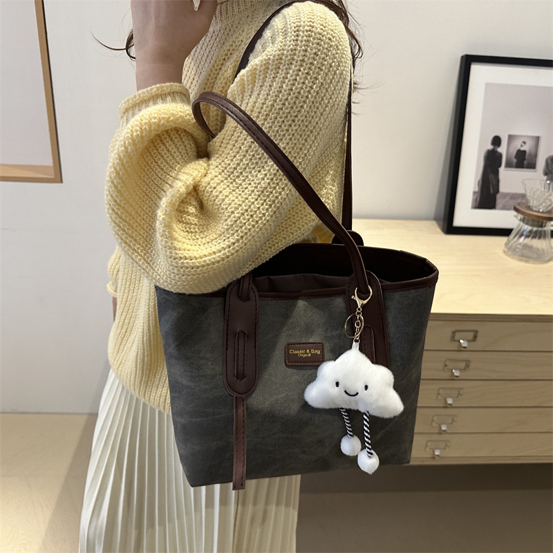 Bolso retro de gran capacidad para mujeres 2024 invierno nuevo estilo de moda textura bolso de hombro simple bolso de viaje