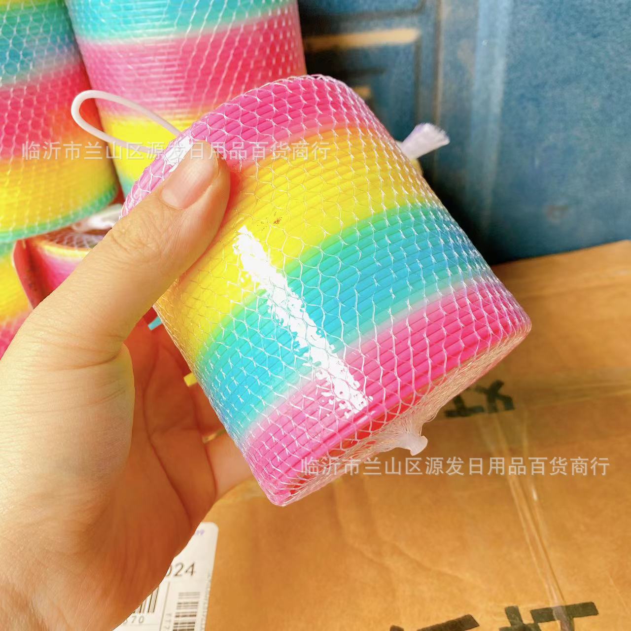 Gran anillo de arco iris puesto Venta caliente al por mayor 8,7*9cm anillo de arco iris niños primavera mágica hula hoop juego de rompecabezas
