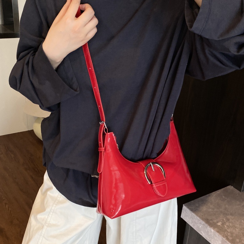 Bolso de alta calidad con textura 2025 verano nuevo estilo bolso de mujer charol brillante bolso de hombro moda todo-fósforo bolso de mensajero marea