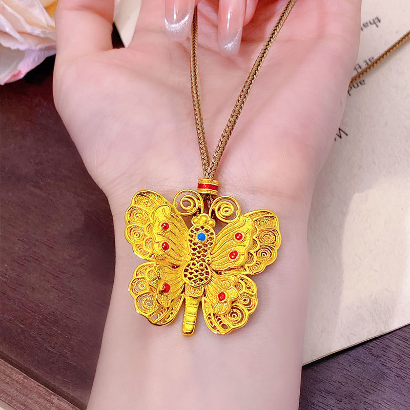 Weixue Style Copper Gold-Plated Enamel Hollow Filigree Butterfly Pendant Necklace with Flowing Butterfly Silhouette and Three-Dimensional Butterfly Sweater Chain