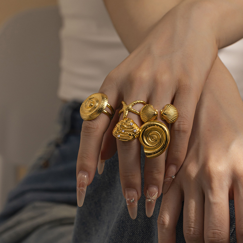 Anillo de acero inoxidable de oro de 18 quilates de TINA nicho de diseño de vacaciones marinas anillo de acero de titanio no se desvanece joyería