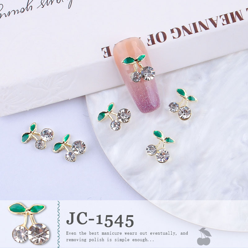 Venta caliente transfronteriza joyería de uñas al por mayor goteo cereza aleación diamante verano lindo fresco Super flash clavo diamante