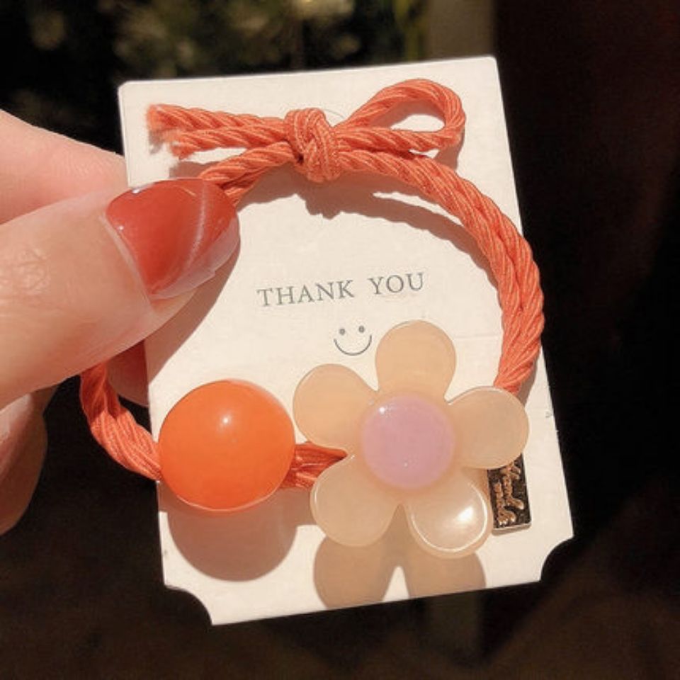 Japonés y coreano Super Hada red cabeza roja cuerda flor redonda banda de goma simple todo-fósforo de la moda de alta apariencia linda chica horquilla