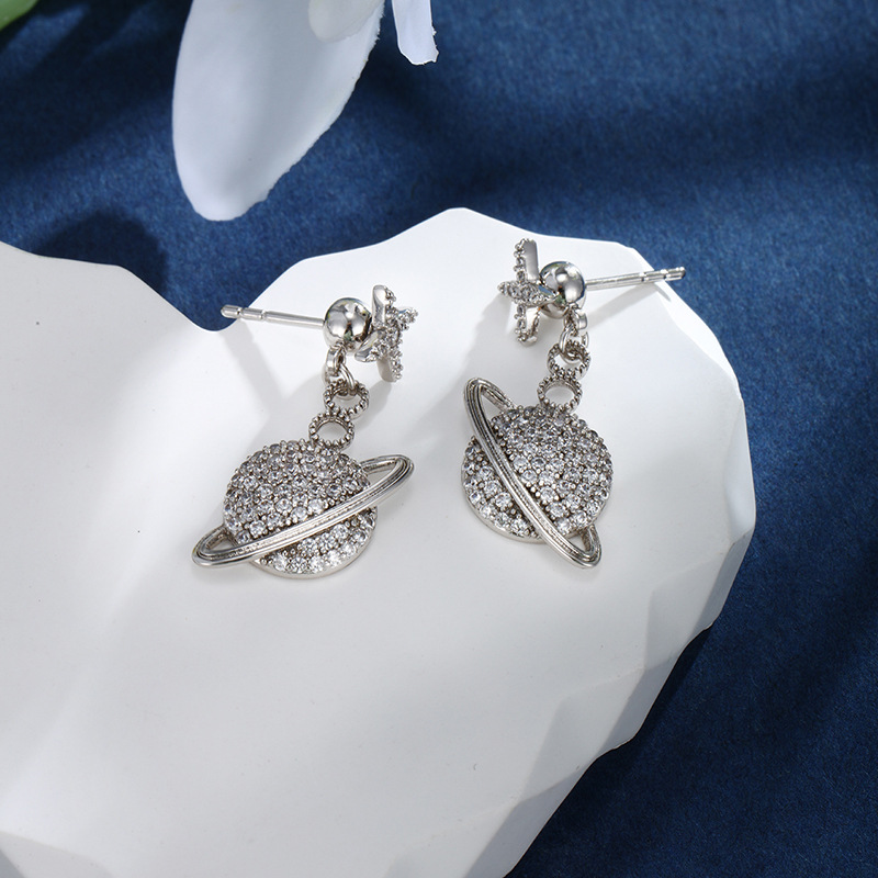Xuping joyas de moda europea y americana nuevos pendientes personalidad simple planeta Saturno micro joyas de orejas de piedra al por mayor