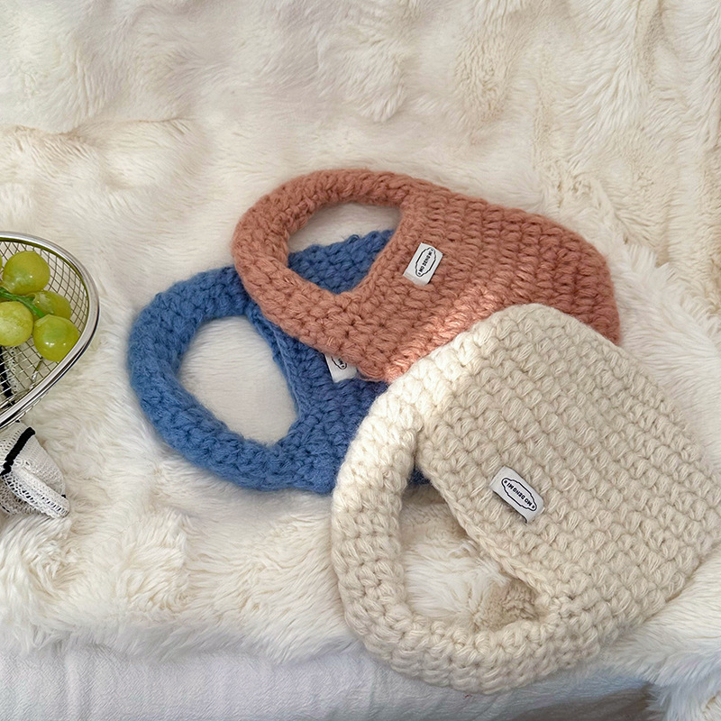 Sal de chicas diarias con bolsas de mano coreanas de color sólido, bolsas de color caramelo de alto nivel de invierno y otoño