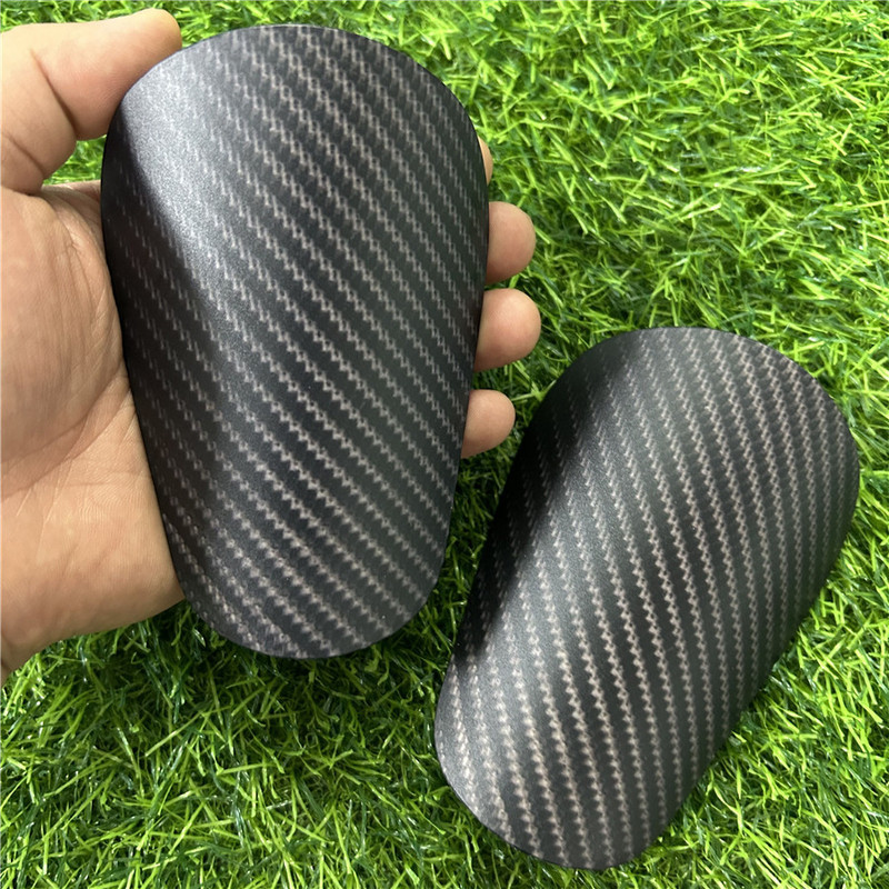 Wholesale Carbon Fiber Pattern Football Shin Guards, Sports Knee Pads, Competition Impact-Resistant Professional Foot Guards, Sports Protective Gear Manufacturer