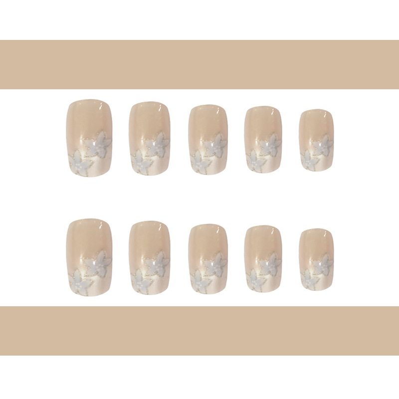 Desnudo, borde blanco, uñas francesas, flores azules, adornos dulces y exquisitos, 24 piezas de parches de uñas terminados.