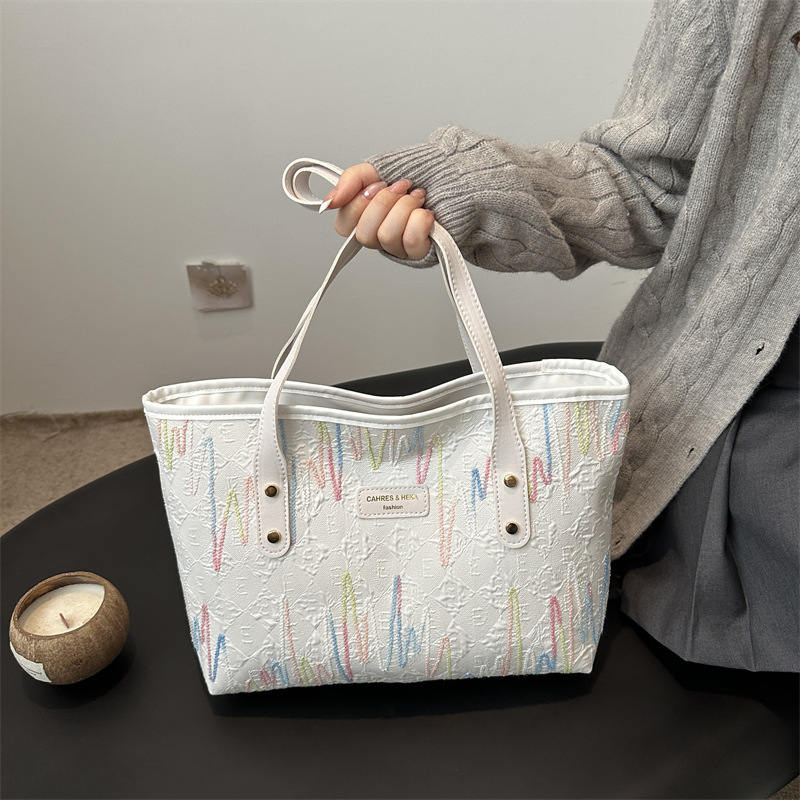 Bolsa de gran capacidad de viaje ocio para mujeres 2024 nueva moda para estudiantes universitarios en clase de hombro único bordado rayas bolsa de mano