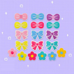 現物のかわいい蝶結びの飾りパッチを貼って、小さな花にアイロンをかけて、刺繍を貼って、コンピュータの刺繍服を貼って、補助金を修理します。